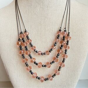 New York and Company layered necklace with peach crystals on gunmetal chains